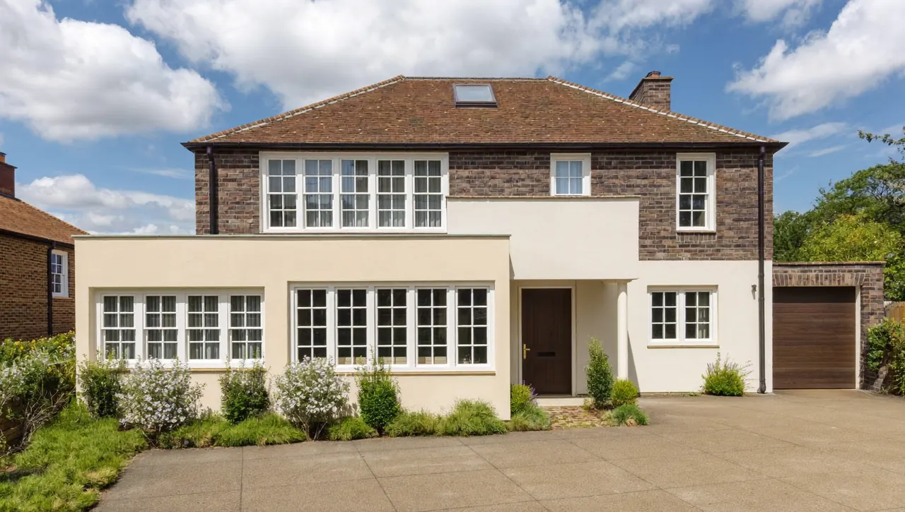 New white casement windows fitted to a semi-detached home